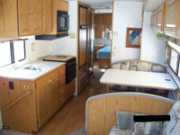 American Dream Vacations - Austin Class A Motor Home - 1 Slide 35WP Brave motorhome rental austin
