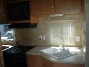 Corona Motorhome Rentals 2007 23ft Redline Toy Hauler rv rental california